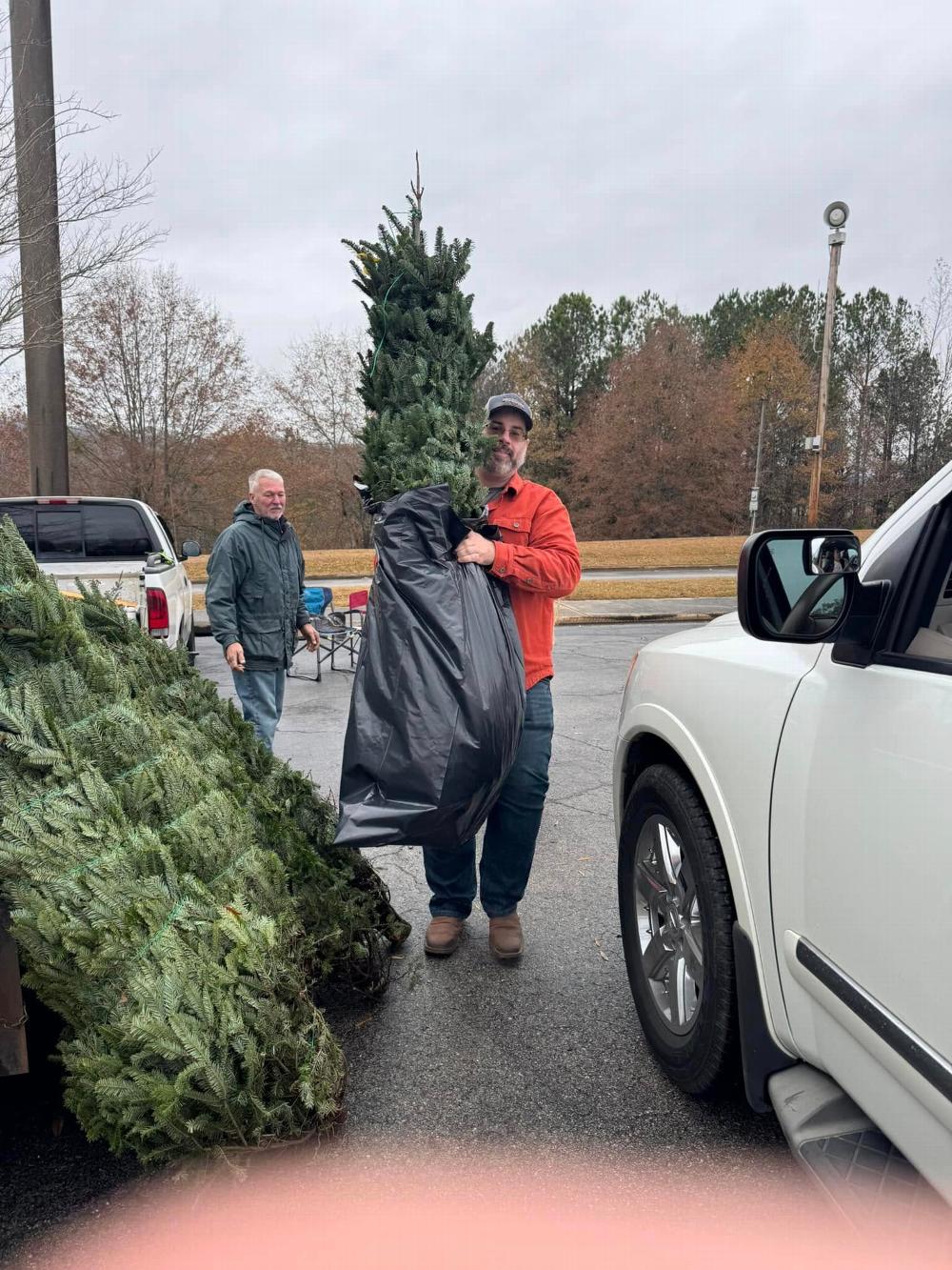 Lodge members Donny Beard and Rich Moenkedick helped load Christmas Trees during Heidi's Kids Christmas Assistance Program's pick-up.  The lodge used money from its ENF Gratitude Grant to assist Heidi's Kids in providing Christmas Trees to families that might not otherwise have one.  Additionally, the lodge further aided Heidi's Kids by providing 120 whole chickens that were given to the families in the program as part of their holiday meal package.