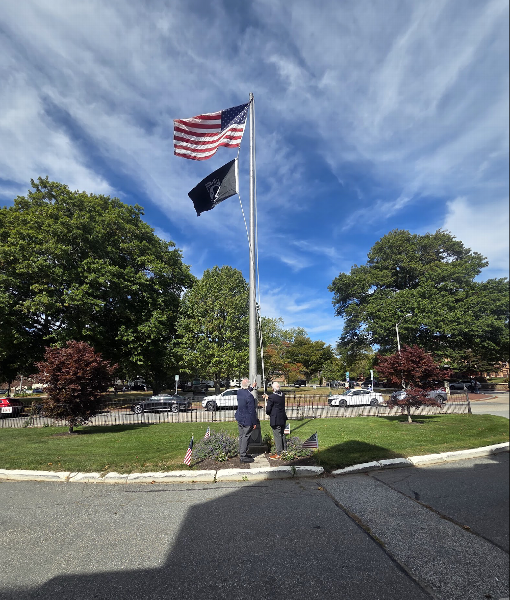 Raising the New MIA flag