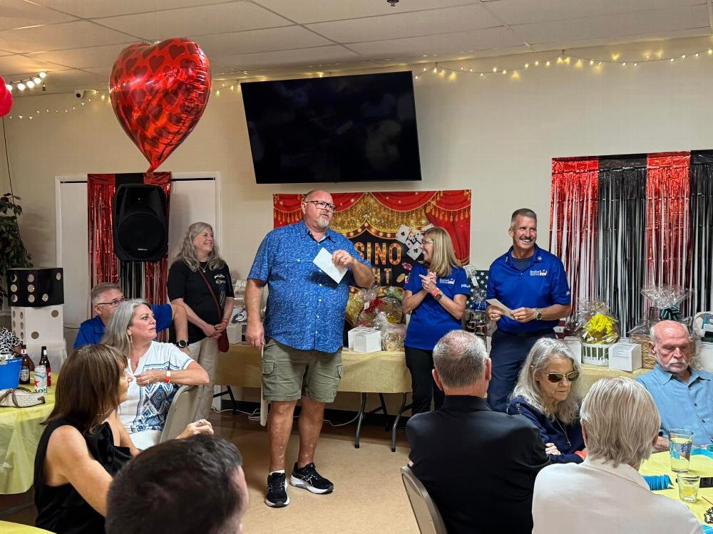 Presentation of $4,750 raised by Table Sponsors for the event to Jeff Morse by ER Brent Reedy