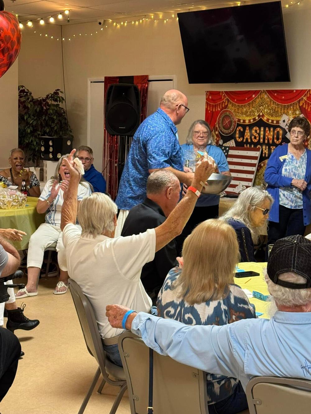 Happy winner of a raffle basket