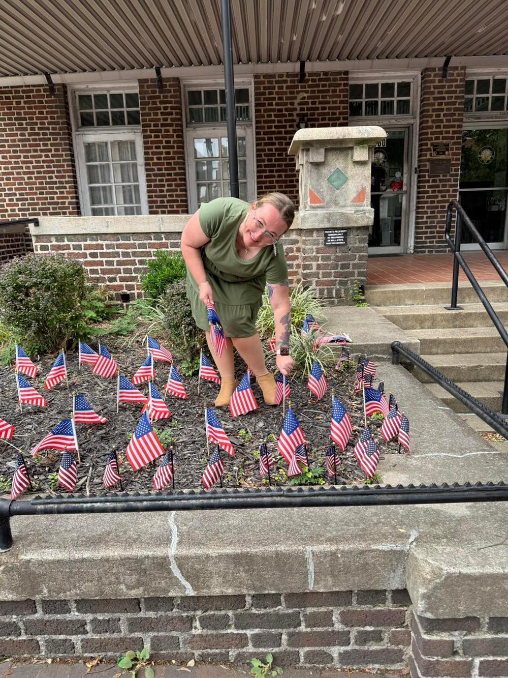 Member Brandi, placing out flags