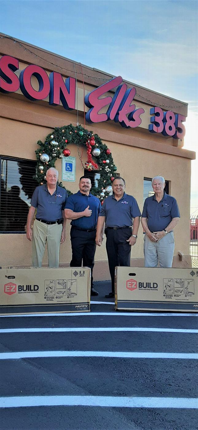 Tucson AZ Elks Lodge #385/Lugo Charities donates 9 kids bicycles and helmets to local non-profit Southern AZ Family Involvement Center(SAFIC). L-R: ER W. Burns, SAFIC representative Ed Casillas, J. Lugo from Lugo Charities, PER B. Holyoak. December 23, 2021