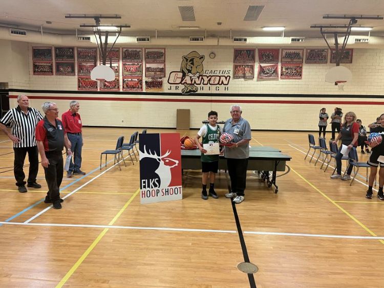 Tucson AZ Elks Lodge #385 Hoop Shooter Rene Cortez shot 24 out of 25 to win the 12-13 boys State Hoop Shoot.  He will recently participated in the  AZ State Hoop Shoot contest in Apache Junction AZ. He also won the Bugs Lewis award for best score in the state competition. Rene is pictured with Rich Botkin, Past AZ State President/South District Leader, AZ State Hoop Shoot Chair Gregg Boyce (left) and other AZ State Hoop shoot representatives. Now Rene is off to the regionals in Las Vegas NV on February 22, 2025.  Let's all wish Rene happy hoop shooting.  
