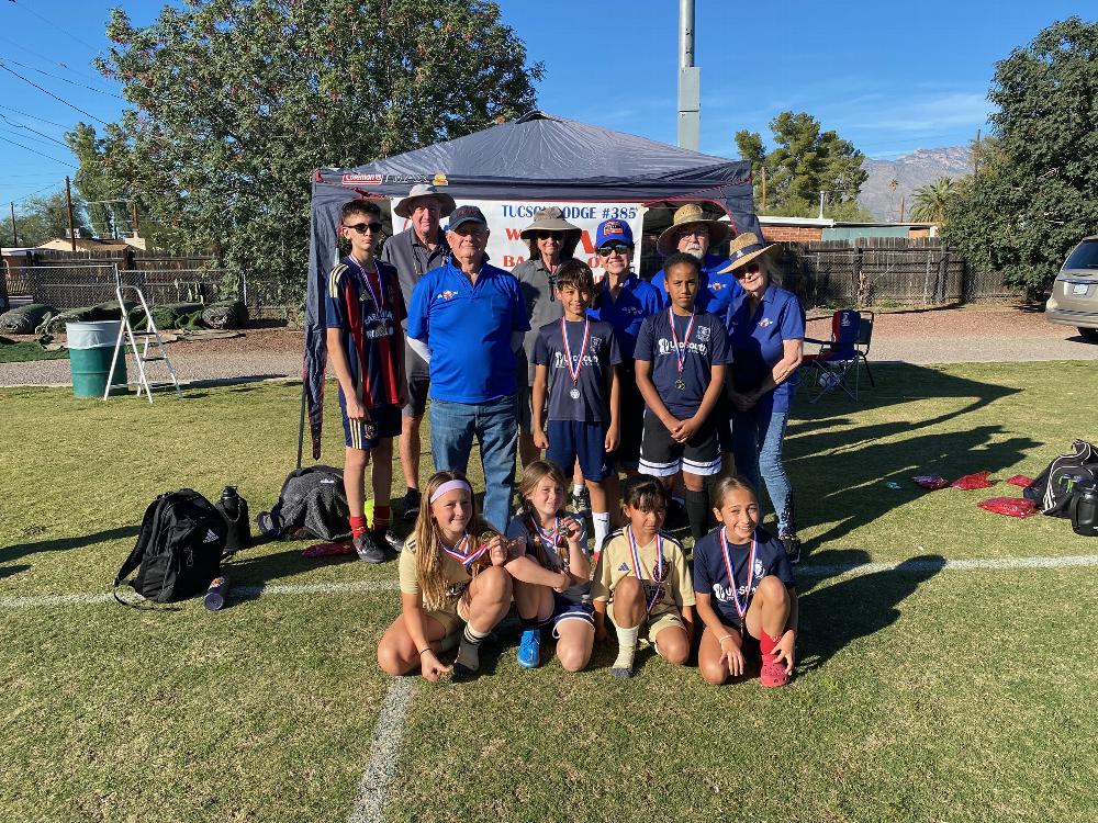 On November 1, 2025, The Tucson Elks Lodge 385 held the Lodge Soccer Shoot at Doolen Middle School in Tucson AZ .  Twenty - five children participated in the U-10, U-12, U-14 divisions.  

Five winners will be promoted to the South District Soccer Shoot in January 2026. The event was made possible with the assistance of the Remote Salt Lake (RSL) youth soccer organization. 

 The successful competition was supported by the following Tucson 385 Elks members.

Esquire- Joe J.                                          Tyler-John S. 
Trustee- Martha M.                                   Member- Trudi S.
ER-Bob Crawford                                      PER-Bob H.
Member-Larry B.                                       PER-Susan T.
Trustee/Soccer chair/PER Wayne Burns