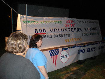 Members working on the Bushwhacker Days Float. Looking it over.