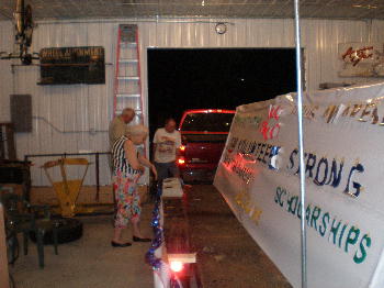 Members working on the Bushwhacker Days Float. Parking it for the night.