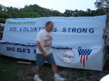 Members working on the Bushwhacker Days Float.
He's working so fast, he's a blur.