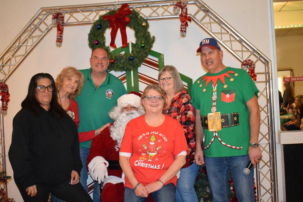 ER Jim and Santa's helpers take a moment to take a picture with Santa
12/8/24