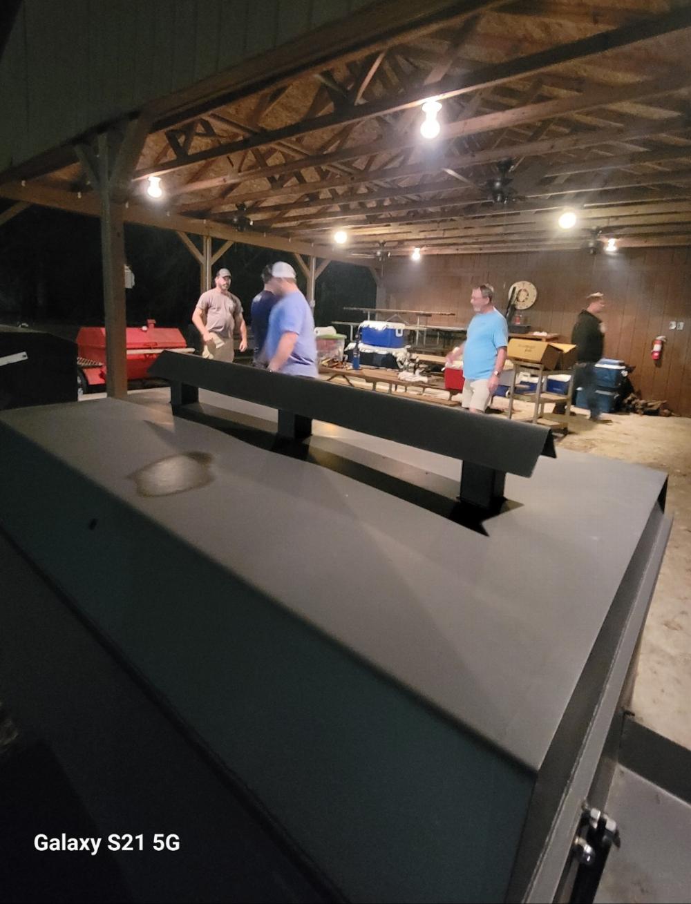 The Grill Masters prep for an evening of rib grilling. Shown is one of the ten or so monster grills.