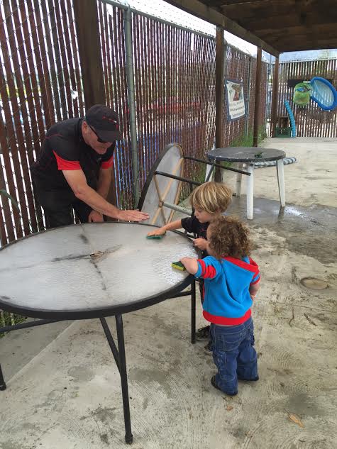 John Scally and two future Elks prepping the pool area for swim season 
- May 2016