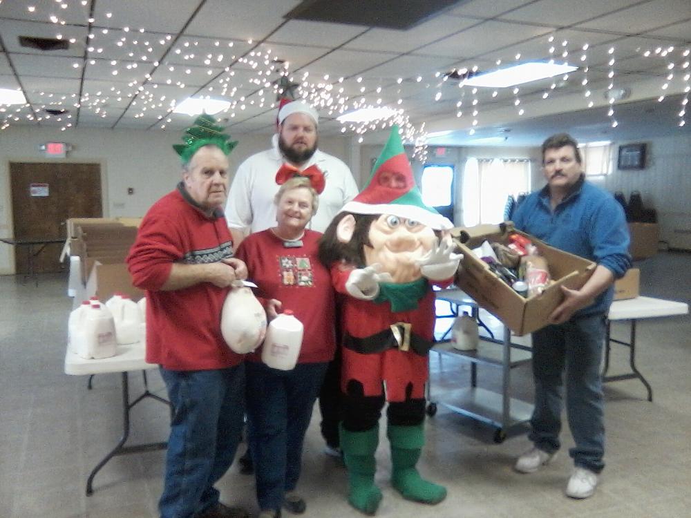 Members of the Franklin Elks Lodge filled over 100 Christmas baskets with food for local families in need. Pictured from left are member Robert Gillespie, State Representative and member Deborah Wheeler, ER Jeffrey Davis, member Mike Emerson, and DDGER/PER/Committee Chair Steve Bourdeau.