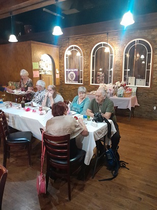 Yep!  Lenna, Secretary, hard at work serving our wonderful members and guests