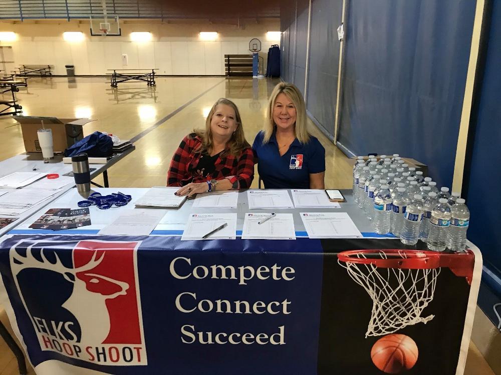 Lori and Michelle at the registration table.