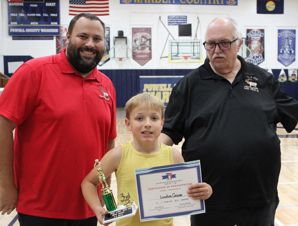 Elks Hoop Shoot 3rd place age 8-9 year olds Landon Cease.   Exalted Ruler Dan Riddle and Leading Knight Jeff Cease