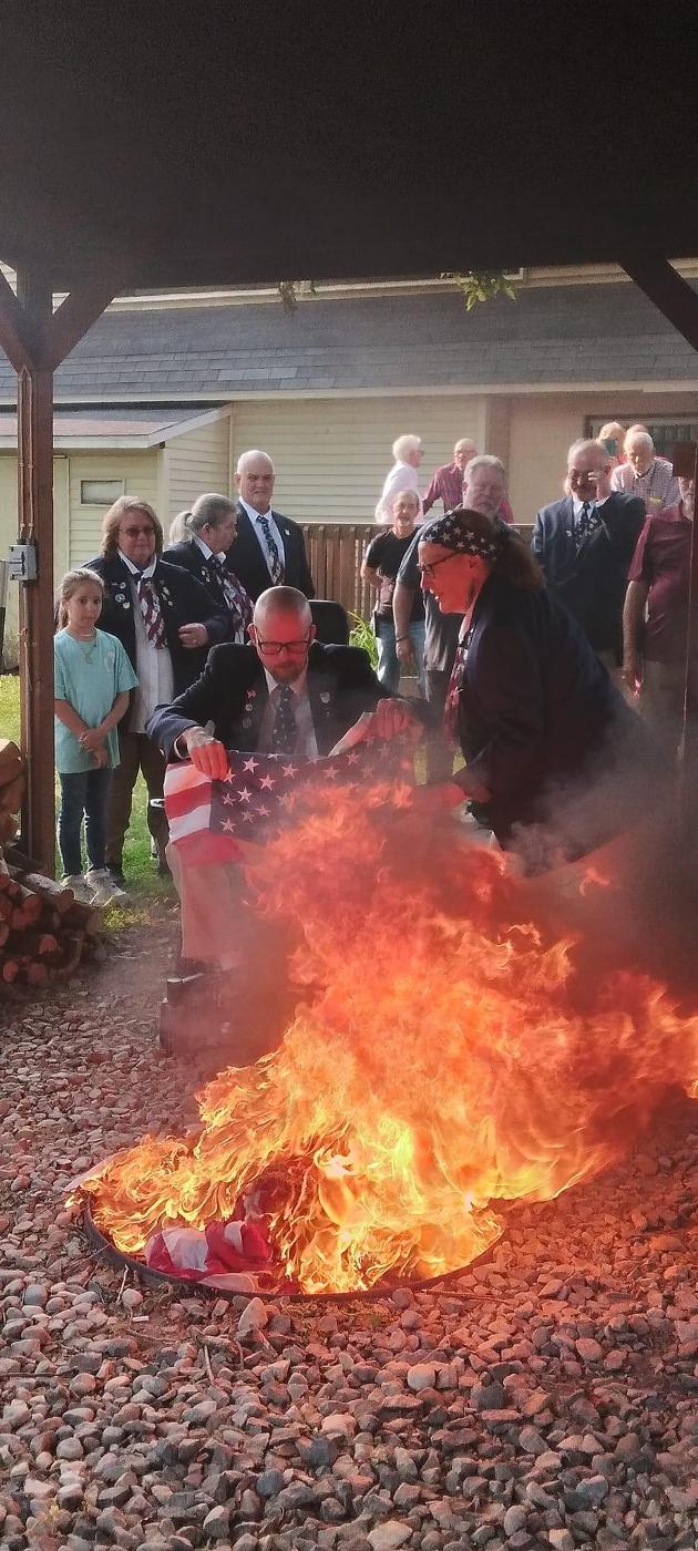 Annual Flag Day Ritual of properly discarding worn flags. 