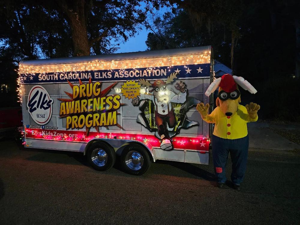 Some photos from the parade last night. First of all, I want to thank Richard and Dawn Blatter for helping. 
Elroy was a big hit. Kids love to see him. I heard a lot of kids saying that he came to our school, we love you, parents saying thank you for being out there teaching our kids not to do drugs. 
So on to the next event. Elroy said to tell everyone Merry Christmas and God Bless.