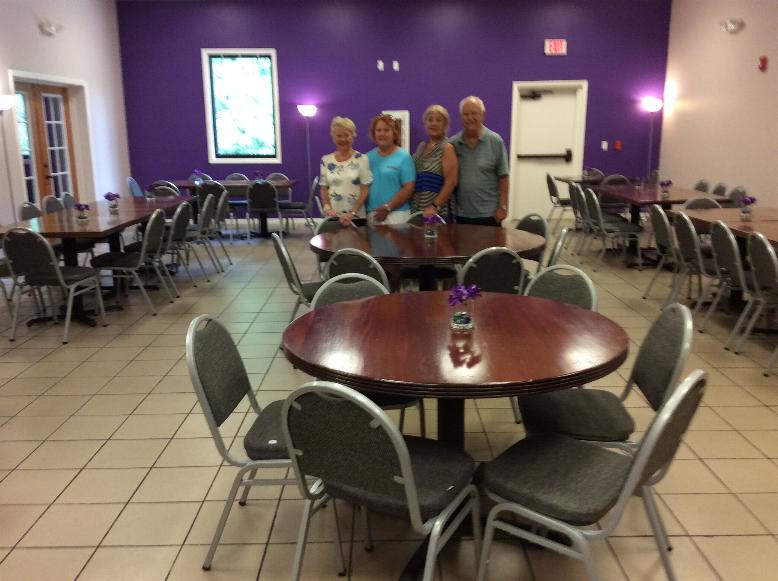 Our Lodge Dinning Room after Painting with some of the volunteers members who helped with cleaning & painting.