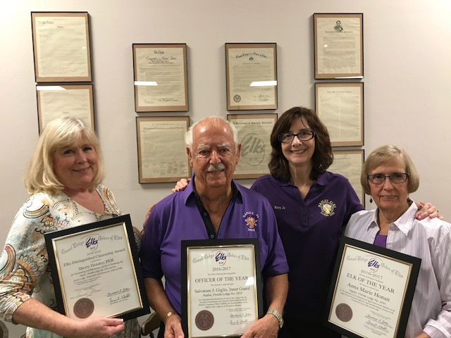 Mary Jo Wojciechowski ER presented awards to, from left to right, Sherry Hensley, PDDGER for Citizen of the Year, Sal Giglio, for Officer of the year and Anna Marie Honan for Elk of the Year. Congratulation for a job well done by all.