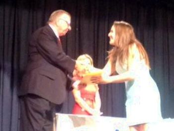 Jennifer Trebilcock presented with her Lodge Scholarship letter by Raymond Honan ER at Barron Collier High School.