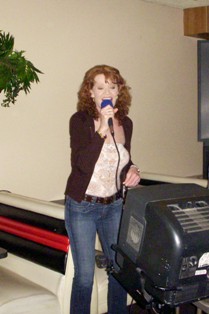 Just can't keep that Nancy in her seat......