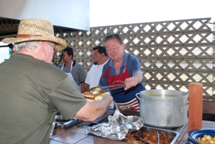 Bud Buck serving up those "Firework" beans and corn... 