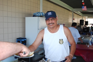 Hey Ray.... isn't that your third time through the line???? Don't blame him the food was excellant.