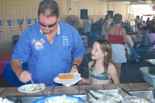 Father and Daughter... "Now Dad... the mayo goes on the right side bun and"... lol