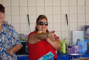 Another of the KIDS..... shooting those soft darts.... 10 points if it goes into a beverage.