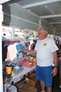 Perry Gardner heads up the team at the "Fireworks Stand"... now that's one big Firecracker!!!!!