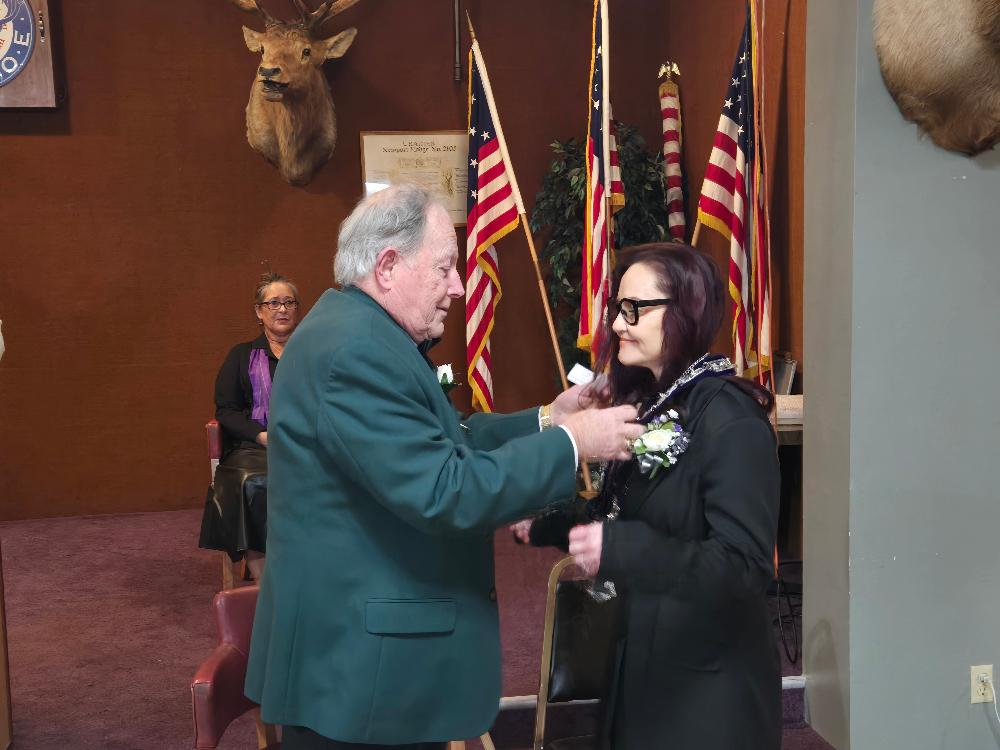 Past District Deputy Bob May installs Tammie Johnson as Chaplain.