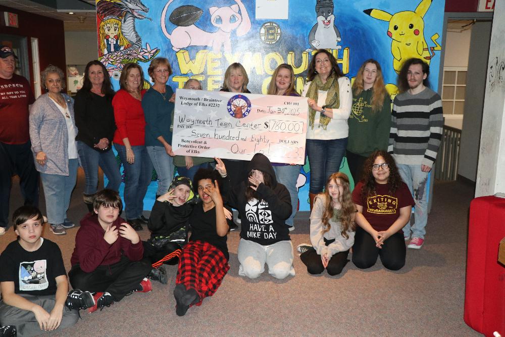 Members Christmas Party Committee  Donated monies Raised  from raffles sales to help support the Weymouth Youth Center 12.24