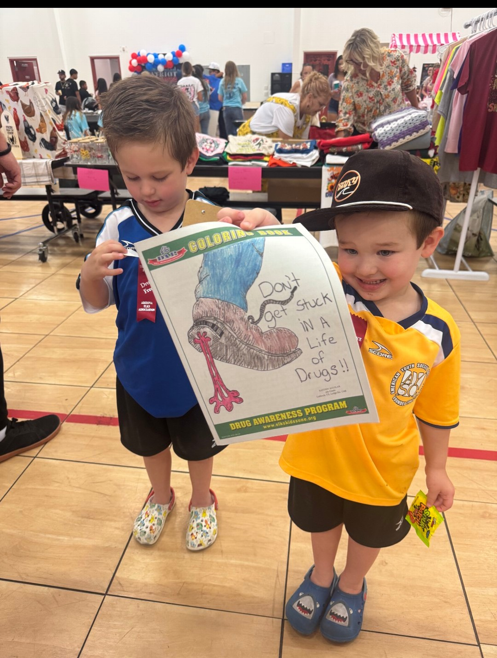 Two tiny booth visitors for  coloring pages! MALC Car show drug awareness booth. Saturday October 11th, 2025