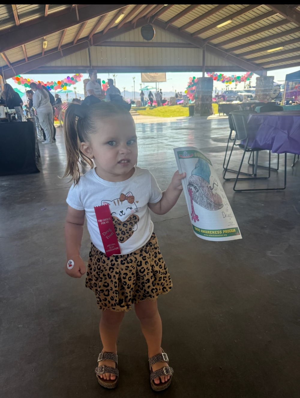 Drug awareness booth little visitor at the Vintage Vibes and rides car show October 18th 2025