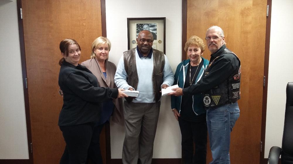 Photo from Veterans Haven - presenting them with $3200 in gift cards.