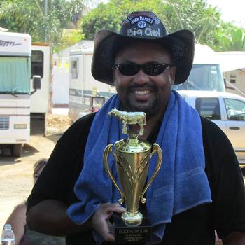 Big Dev holding the trophy for the Best Beef Brisket in the "Up in Smoke" BBQ event at the Vista Lodge September 14, 2013.